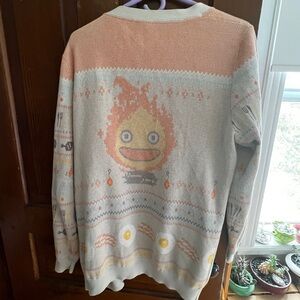 Her Universe Cream and Peach Howl's Moving Castle Calcifer Knit Cardigan
